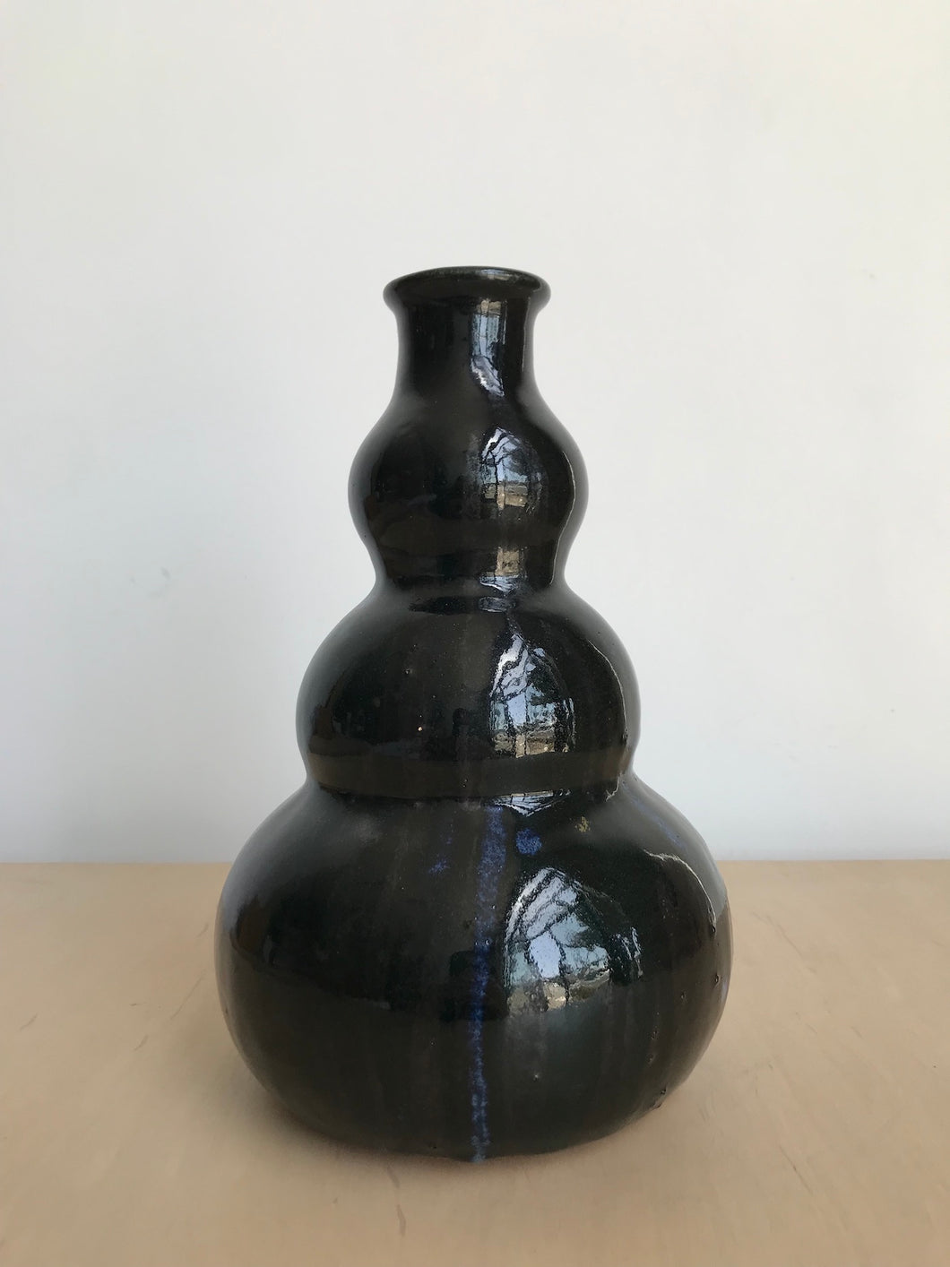 Black Ceramic Vase with Blue Accents