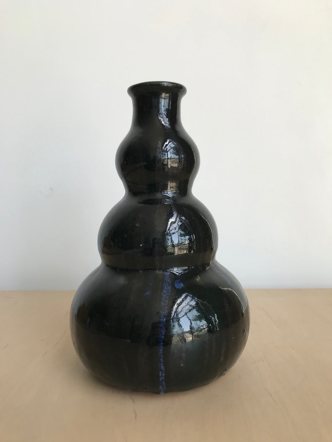 Black Ceramic Vase with Blue Accents