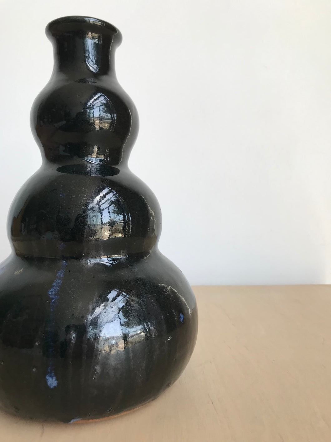 Black Ceramic Vase with Blue Accents