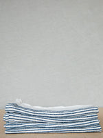 Riviera Napkin in Natural with Navy